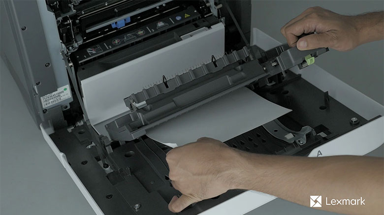 Remove the jammed paper in the duplex unit