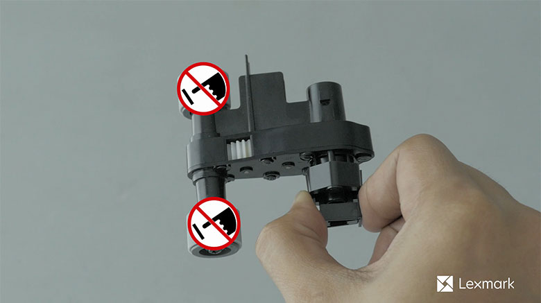 Insert the new pick roller 