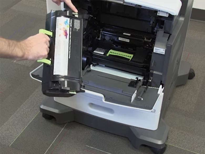 Insert the toner cartridge
